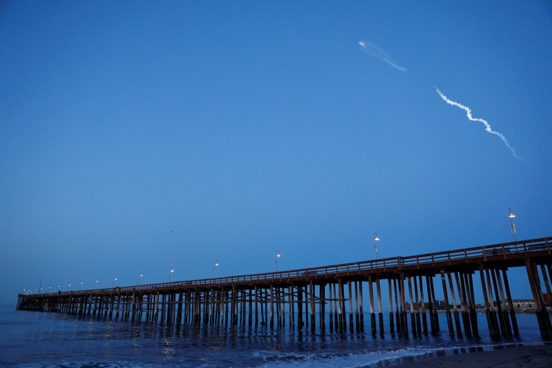 The SpaceX Falcon 9 rocket carrying a PAZ Earth Observation satellite is launched from Vandenberg AFB as seen over the Ventura Pier