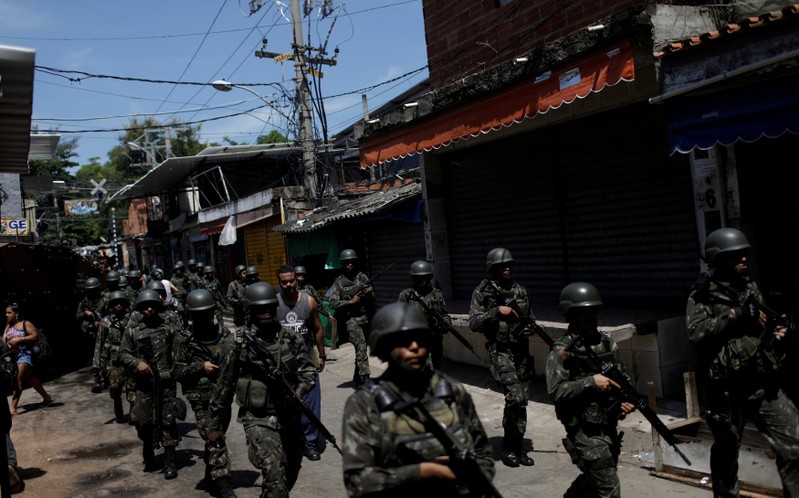 FILE PHOTO: Armed Forces members patrol in Jacarezinho slum during an operation against drug gangs in Rio de Janeiro
