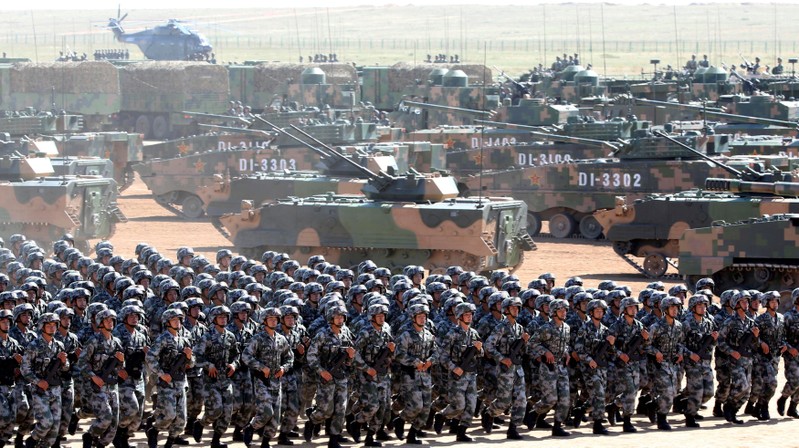 FILE PHOTO: Soldiers of China's People's Liberation Army (PLA) take part in a military parade to commemorate the 90th anniversary of the foundation of the army at the Zhurihe military training base in Inner Mongolia Autonomous Region