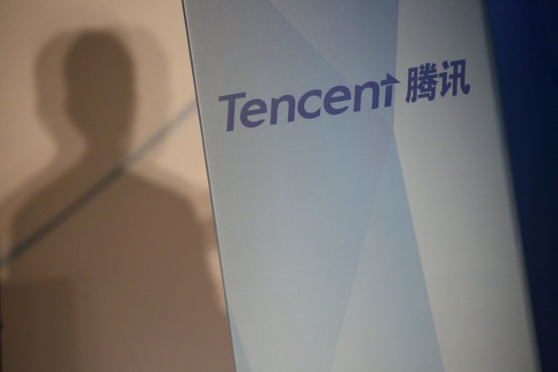 FILE PHOTO: Tencent company name is displayed at a news conference in Hong Kong