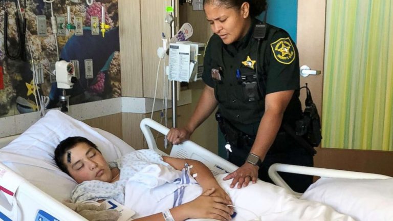 Deputy prays at bedside of teen injured in school shooting