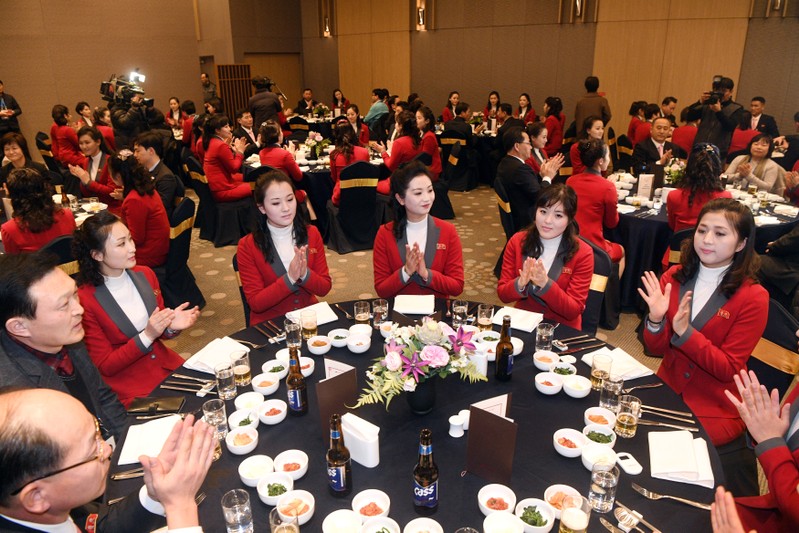 North Korean cheering squad attend a welcome banquet in Inje