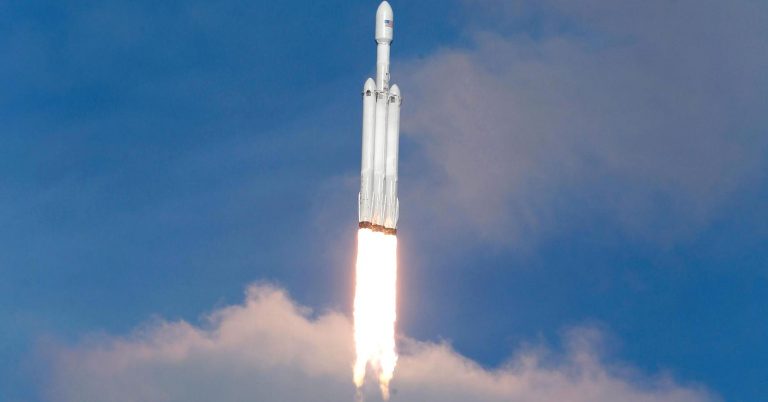 Elon Musk wants ‘a new space race,’ says new SpaceX rocket can launch payloads as far as Pluto