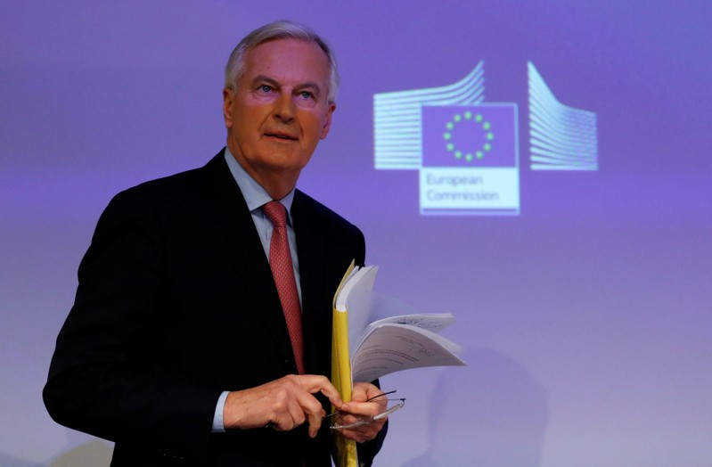 EU's chief Brexit negotiator Barnier arrives to address a news conference in Brussels