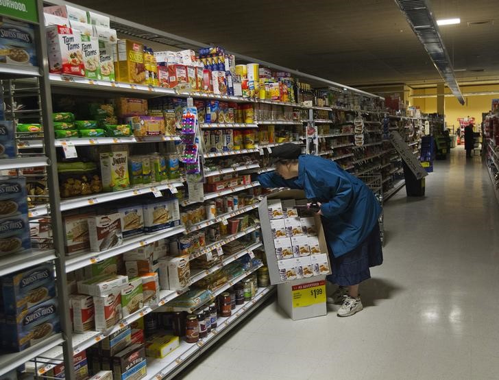 A woman looks for supplies at a Waldbaums grocery store in Long Beach, New York
