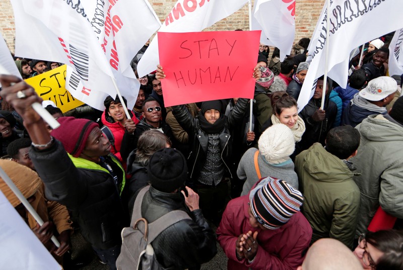 Demonstrators march during an anti-racism rally in Macerata