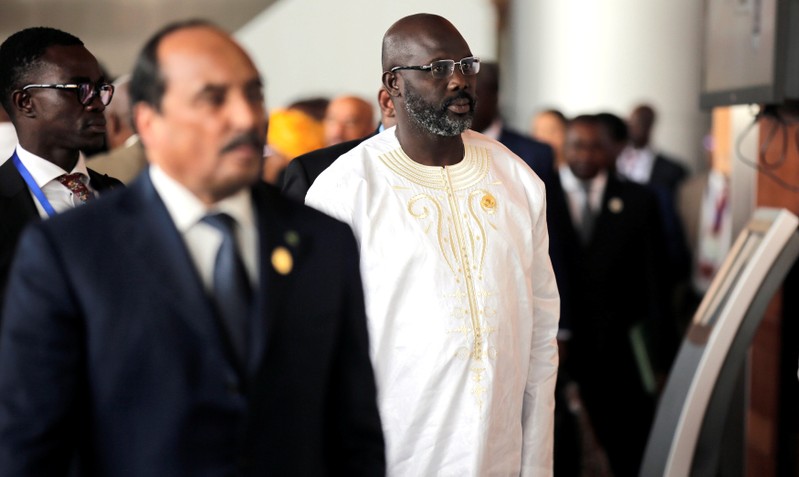 Liberia's President George Weah arrives at the 30th Ordinary Session of the Assembly of the Heads of State and the Government of the African Union in Addis Ababa