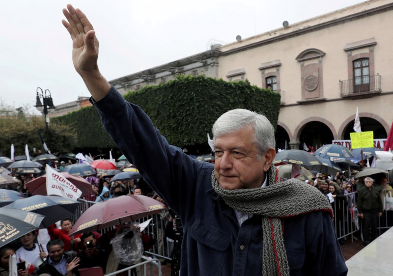 FILE PHOTO: Mexican presidential pre-candidate Andres Manuel Lopez Obrador of the National Regeneration Movement (MORENA) greets supporters, in Queretaro