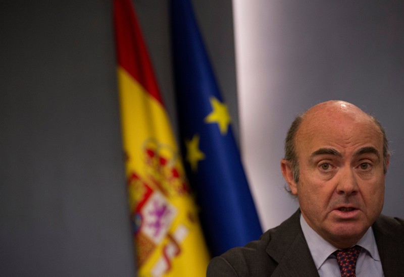 FILE PHOTO:Spain's Economy Minister de Guindos speaks during a news conference after the weekly cabinet meeting at Moncloa Palace in Madrid