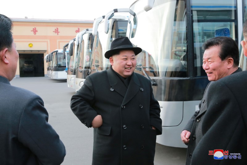 North Korean leader Kim Jong Un inspects a newly established Pyongyang trackless trolley factory