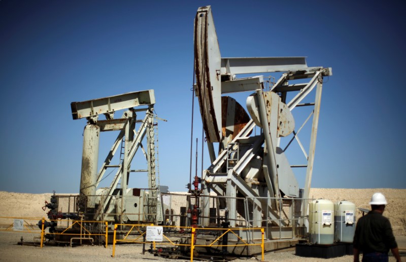 FILE PHOTO - Pump jacks drill for oil in the Monterey Shale California