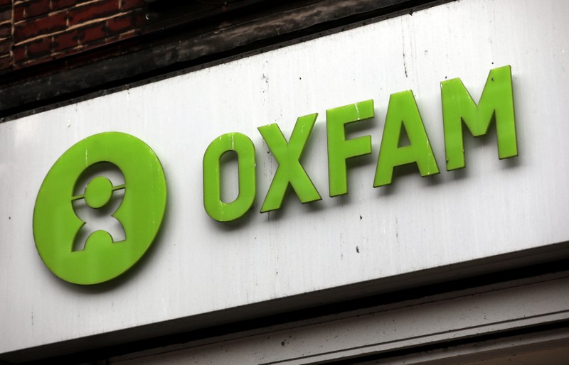 A sign is seen above a branch of Oxfam, in central London