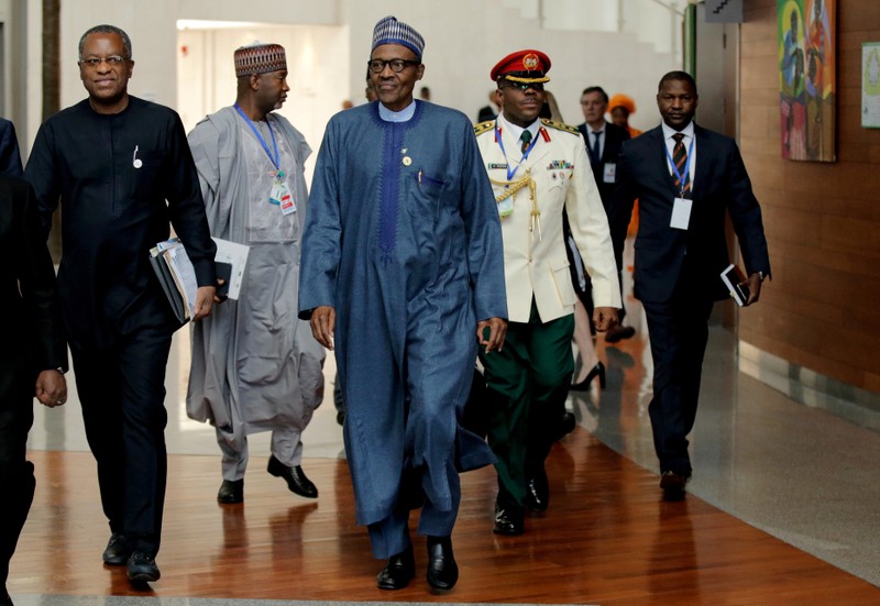 Nigerian's President Muhammadu Buhari arrives for the 30th Ordinary Session of the Assembly of the Heads of State and the Government of the African Union in Addis Ababa