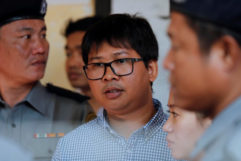 Detained Reuters journalist Kyaw Wa Lone is seen during a break at the court hearing in Yangon