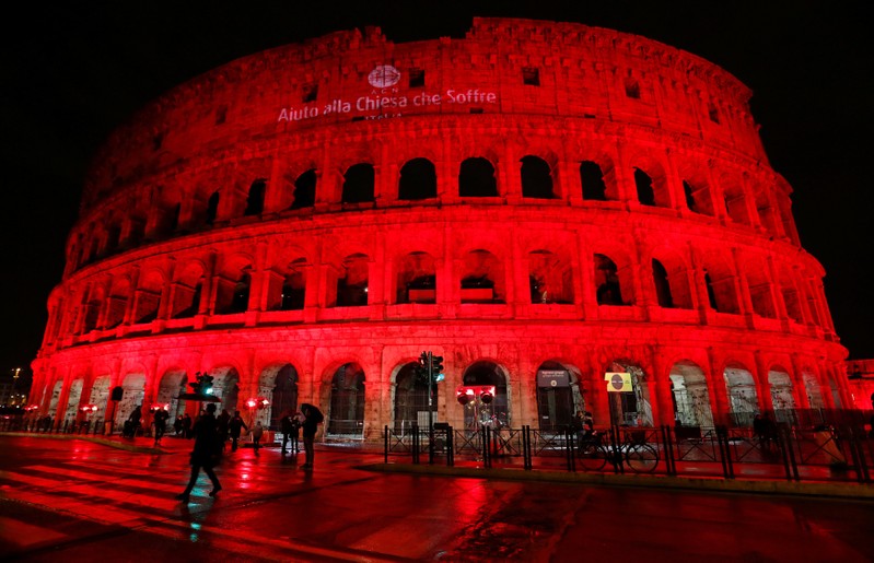 The Colosseum is lit up in red to draw attention to the persecution of Christians around the world in Rome