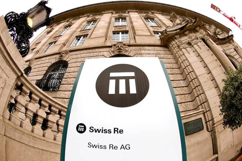 FILE PHOTO: The logo of Swiss insurer Swiss Re is seen in front of its headquarters in Zurich