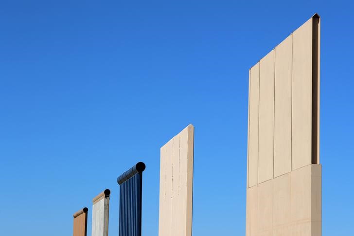 The top of five of U.S. President Donald Trump's eight border wall prototypes are shown near completion along U.S.- Mexico border near San Diego