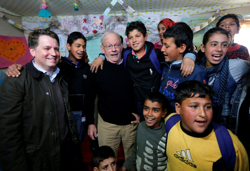 FILE PHOTO: UNICEF Executive Director Lake stands with Forsyth, CEO of Save the Children, as they visit a school inside a refugee camp in Zahle