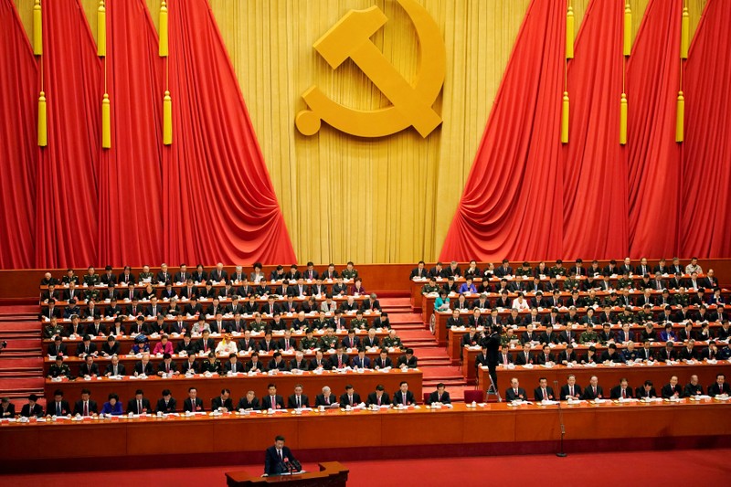 FILE PHOTO: Chinese President Xi Jinping speaks during the opening session of the 19th National Congress of the Communist Party of China at the Great Hall of the People in Beijing