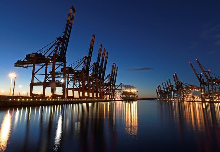 A container ship is seen at the shipping terminal Eurokai in the Port of Hamburg