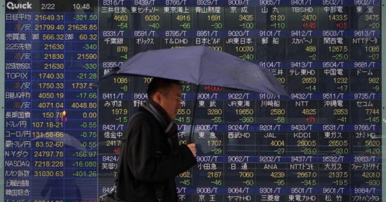 Asian shares close mixed in choppy session after Fed raises rates