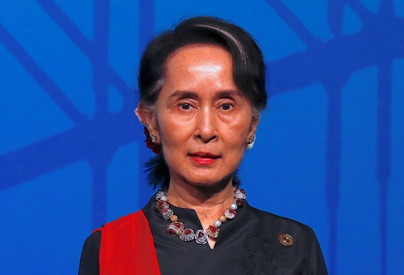 Myanmar's State Counsellor Aung San Suu Kyi stands during the Leaders Welcome and Family Photo at the one-off ASEAN summit in Sydney