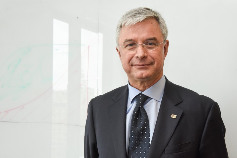 Hubert Joly, the CEO of Best Buy, poses for a photograph before an interview with Reuters in New York