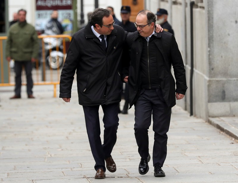 Catalan politicians Rull and Turull arrive to the Supreme Court after being summoned and facing investigation for their part in Catalonia's bid for independence in Madrid