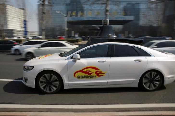 A Baidu's Apollo autonomous car is seen during a public road test for self-driving vehicles in Beijing