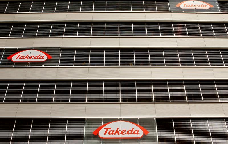 Logos of Japanese Takeda Pharmaceutical Co are seen at an office building in Glattbrugg
