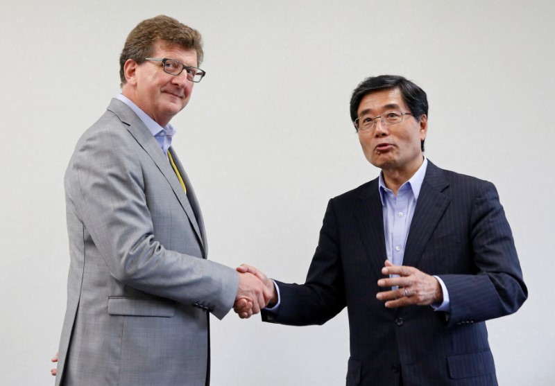 FILE PHOTO: EU chief negotiator Raffaele Mauro Petriccione meets with Japan's chief negotiator Yoichi Suzuki at their Japan-EU Economic Partnership Agreement meeting in Tokyo