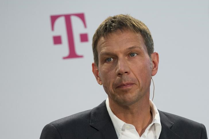 Deutsche Telekom CEO Obermann attends news conference to present a joint initiative for encrypted email with United Internet in Berlin
