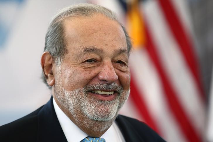 Mexican billionaire Carlos Slim smiles as he attends a ceremony to place the first stone of the new U.S. Embassy in Mexico City