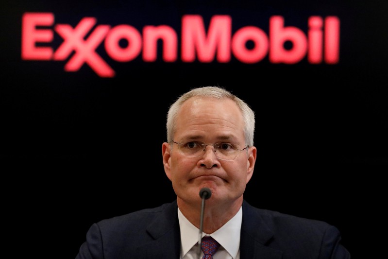 FILE PHOTO: Darren Woods, Chairman & CEO of Exxon Mobil Corporation speaks during a news conference at the NYSE
