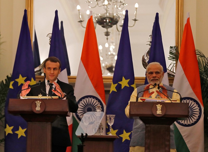 French President Macron and India's PM Modi attend a signing of agreements ceremony at Hyderabad House in New Delhi