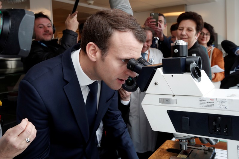 French President Emmanuel Macron visits the Institut Curie Hospital in Paris