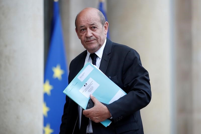 French Foreign Affairs Minister Jean-Yves Le Drian arrives at the Elysee Palace in Paris