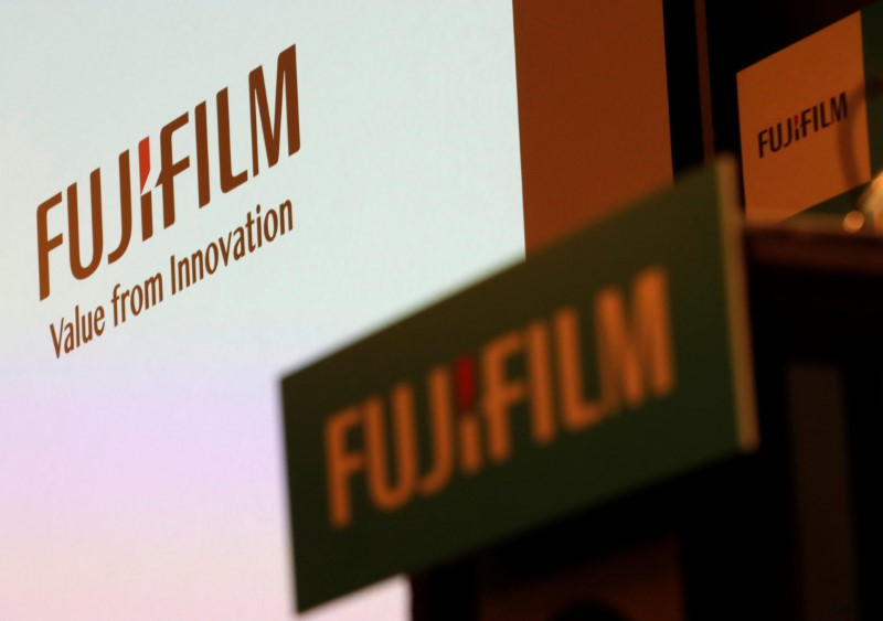 Fujifilm Holdings' logos are pictured ahead of its news conference in Tokyo