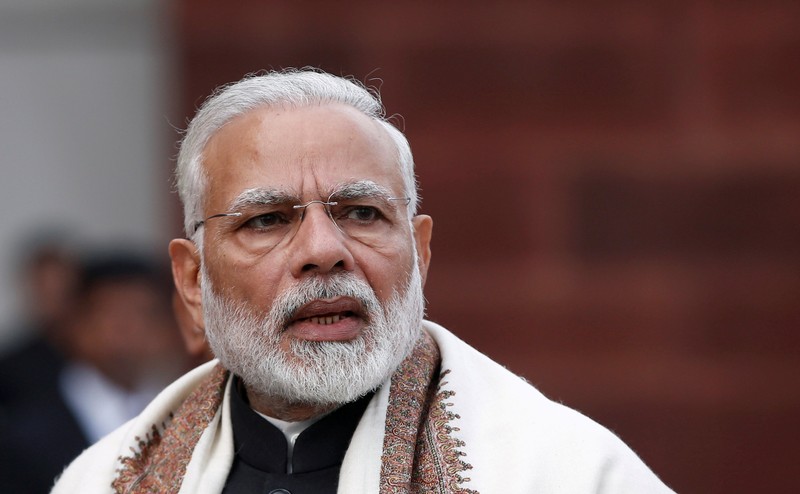 FILE PHOTO: India's Prime Minister Narendra Modi speaks with the media inside the parliament premises on the first day of the budget session, in New Delhi