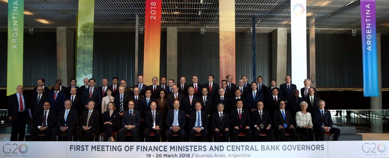 Finance ministers and Central Bank presidents pose for the official photo at the G20 Meeting of Finance Ministers in Buenos Aires
