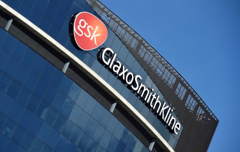 FILE PHOTO: Signage for GlaxoSmithKline is seen on its offices in London