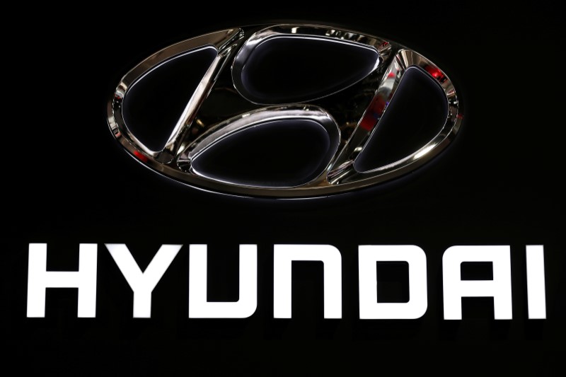 A Hyundai logo is seen on media day at the Paris auto show