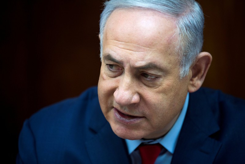 FILE PHOTO: Israeli Prime Minister Benjamin Netanyahu attends the weekly cabinet meeting at the prime minister's office in Jerusalem