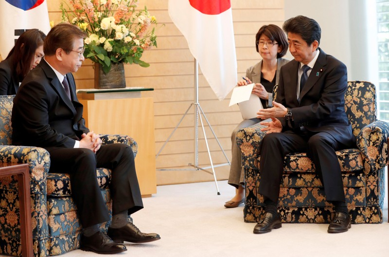 South Korea's National Intelligence Service chief Suh Hoon meets Japan's Prime Minister Shinzo Abe in Tokyo
