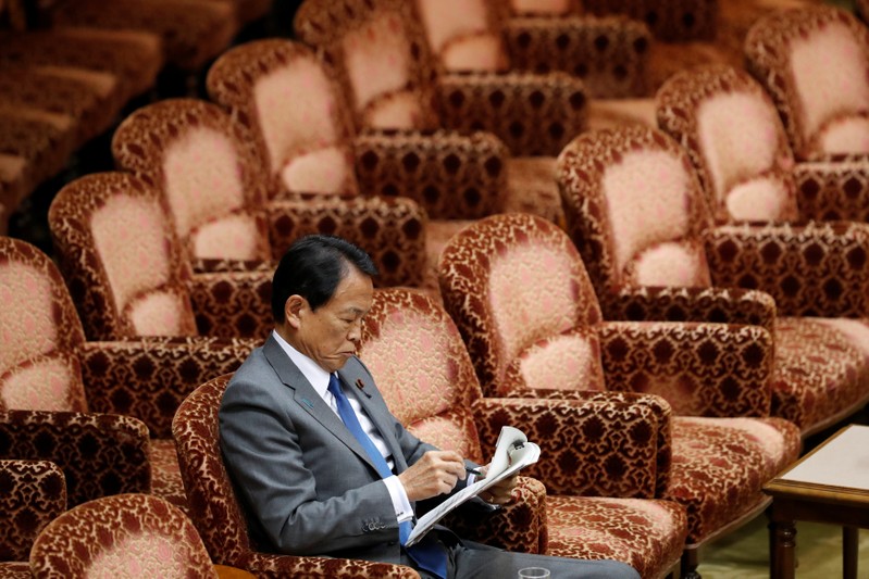 Japan's Finance Minister Taro Aso attends an upper house parliamentary session in Tokyo