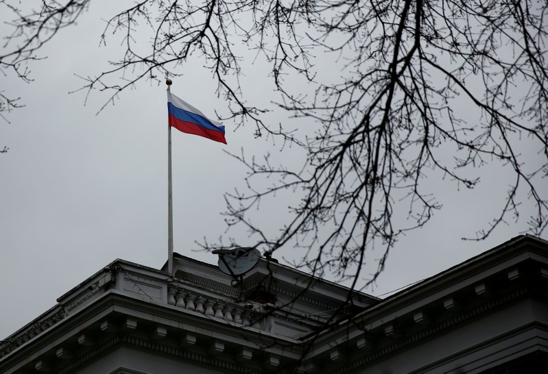 FILE PHOTO: Russian flag flies atop Consulate General of the Russian Federation in Seattle