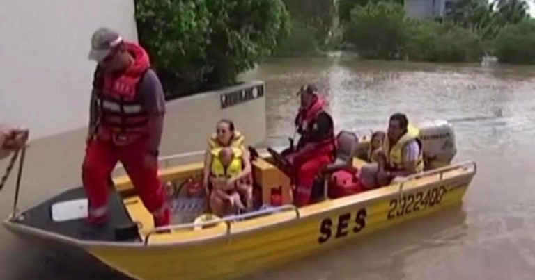 Massive flooding in Australia leaves some stranded, poses threat