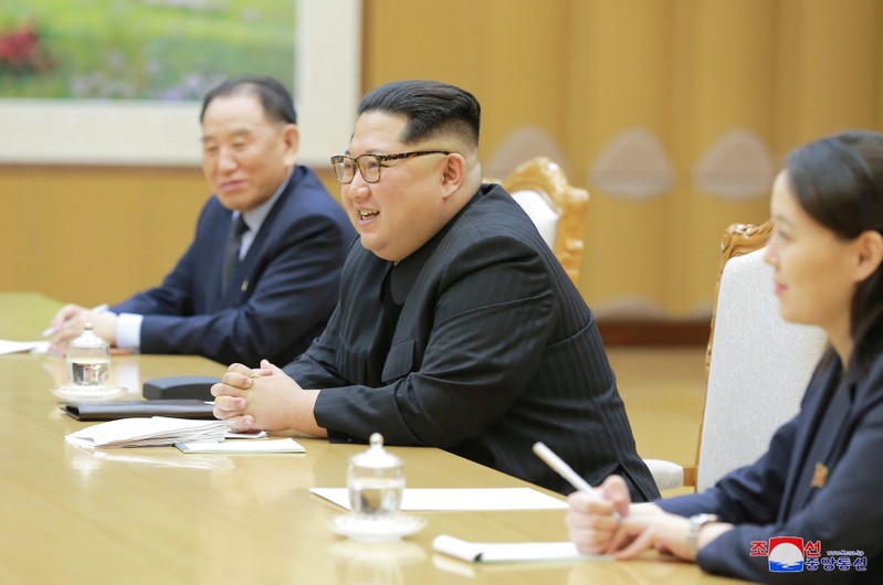 North Korean leader Kim Jong Un meets members of the special delegation of South Korea's President in this photo released by North Korea's Korean Central News Agency
