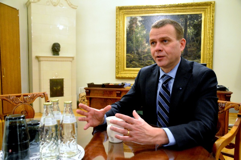 FILE PHOTO: Finland's Finance Minister Orpo listens to the media in Helsinki