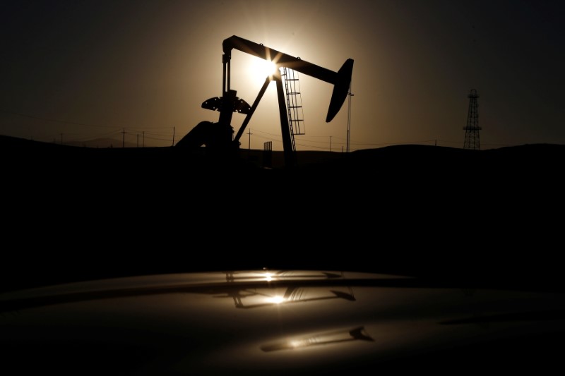 FILE PHOTO: A pump jack is seen at sunrise near Bakersfield